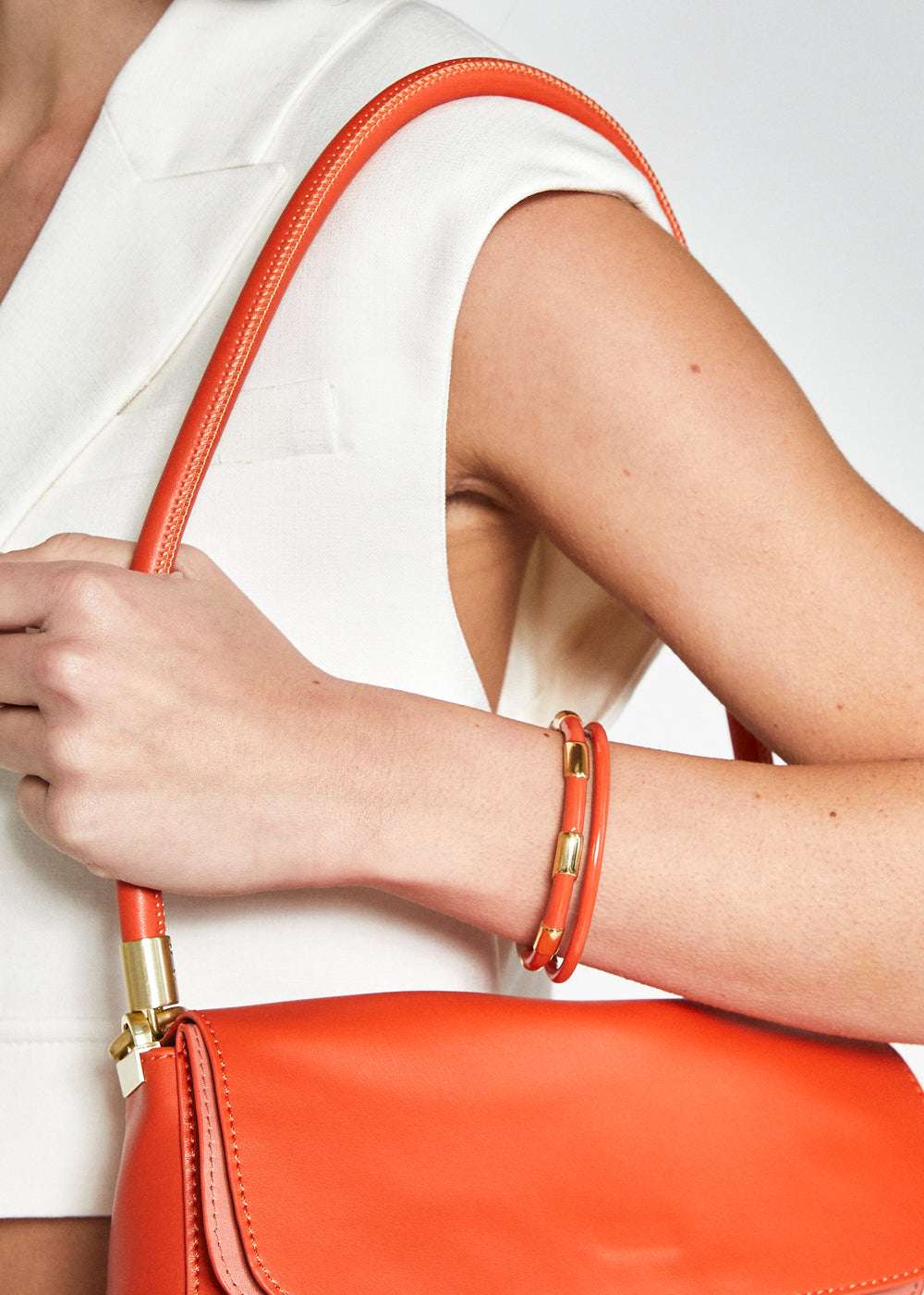 BRACCIALE ECHO ACC.INOS. SMALTATO ARANCIO NALÌ