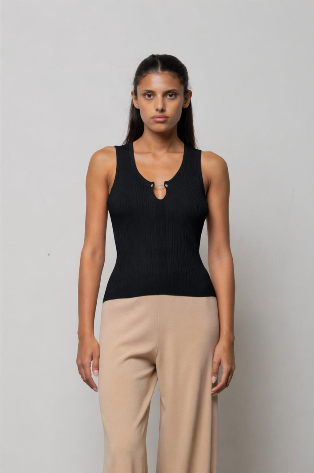 TOP DI MAGLIA A COSTE CON PIERCING KAOS
